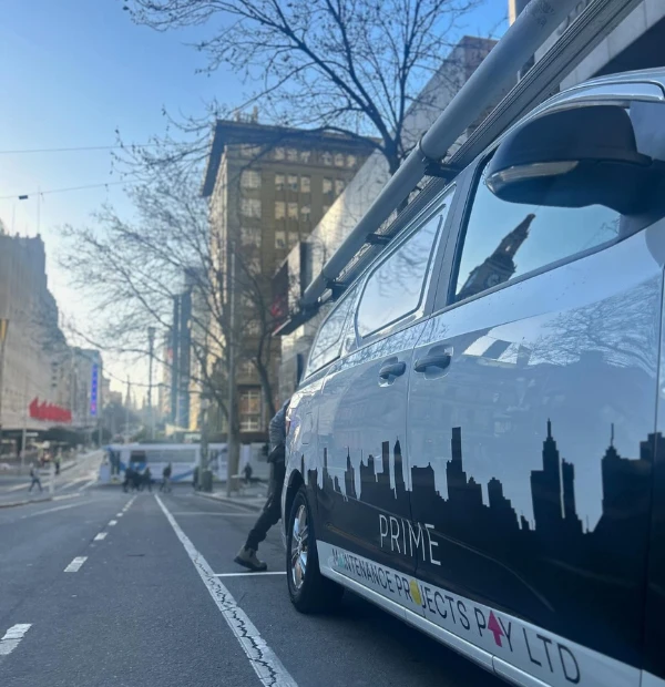 Prime Maintenance Projects service van parked on a Melbourne city street, ready for property maintenance work