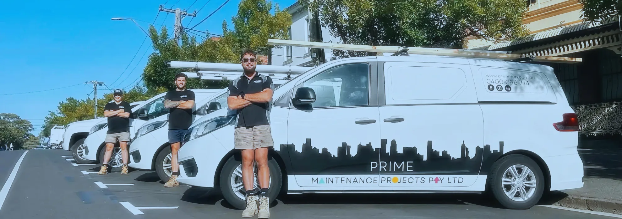 Prime Maintenance Projects team with branded vans providing property maintenance services in Melbourne