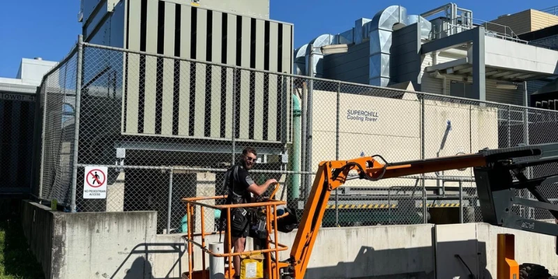 Prime Maintenance Projects team member performing professional property maintenance work at a commercial facility.